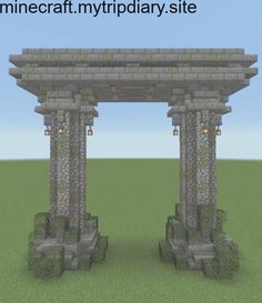 two stone pillars in the middle of a field