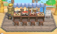 an animal crossing game is set up on the beach with food and drinks in front of it