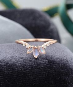 a close up of a ring on a chair with the light shining through it's petals