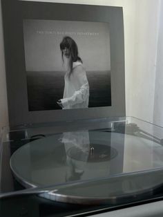 an old record player is sitting on the table