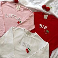 These cute Cherry Coquette Big Little Sorority Sweatshirts are great for Big Little Reveal! They are perfect to give to your big/lil as a gift and match outfits with! <3  - These letters are iron-on patched and is heat pressed, not embroidered. Rest assured the won't come off! - You have to purchase the sweatshirts individually. - All our sweatshirts run a Unisex fit. They are naturally oversized, but if you like a more baggy look, we recommend sizing up. - Material is super soft and comfy! ♡ - Lil So Sweet Soroity Reveal, Pink Tops With Embroidered Graphics For Winter, Cute Long Sleeve College T-shirt, Cute Letter Embroidery Sweatshirt For Winter, Trendy Long Sleeve Top With Letter Embroidery, Cute Crew Neck Top With Embroidered Text, Cute White College Tops, Cute Spring College Tops, Trendy White Tops With Letter Embroidery