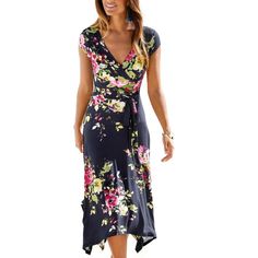 Whether you have a special occasion or simply want to radiate beauty on any given day, this dress is your ultimate go-to. * Overlapping V-neckline * Handkerchief hem style * Ties at the waist * Print may vary * Skirt length approx. 28 inches * 95% Viscose, 5% Elastane. Imported. * Machine wash cold with like colors, inside out * Hang to dry or lay flat Fitted Maxi Dress With Floral Print And Surplice Neckline, Bohemian Fitted Wrap Dress With Surplice Neckline, Fitted Maxi Dress With Surplice Neckline For Summer, Floral Print V-neck Wrap Dress For Garden Party, V-neck Floral Print Wrap Dress For Garden Party, Fitted Floral Dress With Surplice Neckline, Fitted Floral Dress With Surplice Neckline For Brunch, Bohemian V-neck Wrap Dress With Floral Print, Fitted Floral Print Dress With Surplice Neckline