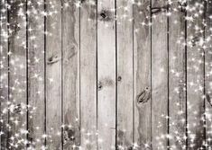 an old wooden background with stars and sparkles on the wood planks in black and white