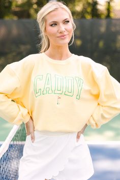 Call Me Caddy Yellow Embroidered Graphic Corded Sweatshirt Preppy Long Sleeve Cotton Sweatshirt, Sporty Crew Neck Sweats For Campus, Sporty College Sweatshirt For Spring, Sporty Long Sleeve Sweats For Campus, Collegiate Spring Sweatshirt With Ribbed Cuffs, Collegiate Style Sweatshirt With Ribbed Cuffs For Spring, Sporty Crew Sweatshirt With Letter Embroidery, Preppy Cotton Sweatshirt For Fall, Sporty Spring Sweater With Embroidered Logo