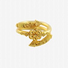 "This beautifully crafted 22K yellow gold Byzantine ring is composed of thick gauge wire formed into an open coil and features a large rosette at the center.  The petals of the flower are edged with rope detail and the floral motif itself is flanked by groupings of granulation.  The decoration includes tightly wrapped twisted rope wire that is adjacent to pairs of applied curvilinear wire shapes.  The shapes are mirror images of each other and have granulation arranged in the form of a flower at Gold Spiral Wedding Ring, Gold Byzantine Wedding Rings, Gold 22k Byzantine Rings, Gold Byzantine 22k Rings, 22k Gold Byzantine Rings, Byzantine Style 22k Gold Rings, Byzantine Ring, Wire Shapes, Byzantine Rings