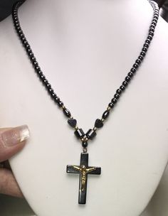 Beautiful hematite beads, 4mm beads, crucifix is 33 x23mm. Screw barrel clasp. This is very nicely done. Gold Crucifix Necklace With 8mm Beads, Small Beaded Necklace, Beaded Crucifix Necklace, Black Beaded Crucifix Jewelry, Adjustable Black Rosary With 8mm Beads, Black Metal Crucifix Necklace, Handmade Black Crucifix Necklace, Tissue Paper Wrapping, Gold Pin