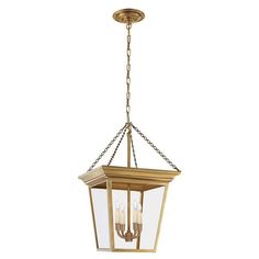 a hanging light fixture with three lights and chains on the bottom, in an antique brass finish