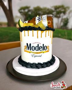 a cake made to look like a modelo beer bottle