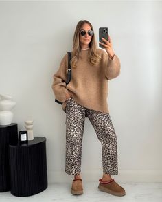 Cropped Plaid Pants Outfit, Cheetah Barrel Jeans Outfit, Wide Leg Leopard Jeans Outfit, Leona Dr Martens Outfit, Leopard Button Down Shirt Outfit, Leapord Jeans Outfits, Leopard Barrel Jeans Outfit, Leopard Pants Outfit Winter, Leopard Slip Skirt Outfit