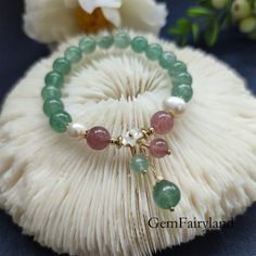 🌺 Features Beads are connected by a elastic string, fit most wrist sizes range from 6 - 7 inch 🌺 Please follow this link to visit my store to find more great widgets: https://www.etsy.com/shop/CrystalpipesStore?ref=simple-shop-header-name&listing_id=904320137 🌺 Please pay attention before buy The main material of the bracelet is made of natural amethyst, so it is difficult to be flawless, it may contain some small strips, or the color may be dark or light than what you see in the picture. Tak Hand-strung Round Beads Jewelry For Mother's Day, Hand-strung Pearl Bracelet With Round Beads As Gift, Hand-strung Round Beads Bracelets For Mother's Day, Hand-strung Bracelets For Mother's Day, Luxury Hand-strung Beaded Bracelets For Mother's Day, Mother's Day Hand-strung Round Bead Bracelets, Green Round Beads Bracelets For Mother's Day, Healing Beaded Bracelets With Round Beads For Mother's Day, Beaded Pearl Bracelet For Mother's Day