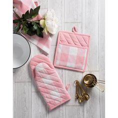 pink and white checkered kitchen towels, utensils and flowers