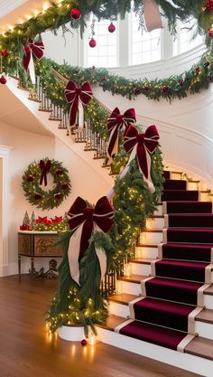 a staircase decorated for christmas with wreaths and lights