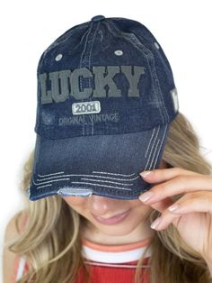 With a vintage, distressed look and adjustable back strap, this ballcap is one size fits most. This denim fabric will be your go-to for everything from relaxing at home to wearing out on the town. Dark wash ballcap Vintage Distressed Adjustable back strap Stiff rounded bill Denim fabric One size fits most Relaxing At Home, French Guiana, Equatorial Guinea, Ball Cap, Back Strap, Denim Fabric, Dress First, Laos, Caribbean Netherlands