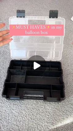 someone is holding a plastic container with compartments in it and the words must haves in my balloon box