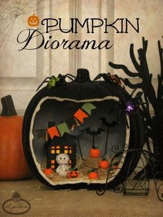 pumpkin diorama with halloween decorations in the background