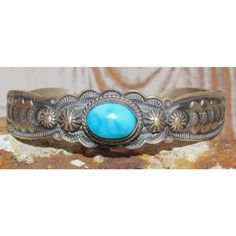 Phenomenal sterling silver & blue Royston mine turquoise Native American Navajo stacker cuff bracelet by the Navajo artist Bennie Ramone. Wonderful craftsmanship and attention to detail, intricately hand stamped tribal design. The inside circumference is about 7" including the gap. The gap is about 1 1/2". The cuff is adjustable. Stamped sterling, signed by the artist. Beautiful example of wearable Native American art to add to any jewelry collection. Great to add to your stacker cuff collection Southwestern Engraved Blue Cuff Bracelet, Artisan Blue Engraved Cuff Bracelet, Southwestern Style Stamped Blue Bracelets, Bohemian Stamped Blue Bracelets, Blue Stamped Bohemian Bracelets, Bohemian Blue Stamped Bracelets, Southwestern Style Blue Sterling Silver Bracelet, Artisan Engraved Blue Bracelets, Bohemian Blue Stamped Jewelry