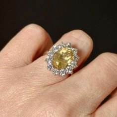 Exclusive in its highly sought-after honey yellow color this oval natural citrine, adorned with  diamond halo is an instant statement making show stopper. Breathtaking in its classic simplicity and timeless design, this ring is a modern day heirloom. 🔸Citrine: 12mm X 10mm 🔸 FG/VS Lab Diamonds: 1.75ctw 💍Any custom design is available. Please follow us on Instagram: https://www.instagram.com/missionewyork/ Honey Yellow Color, Honey Yellow, Natural Citrine, White Solid, Diamond Halo, Birthstone Ring, Cocktail Ring, Lab Diamonds, Cocktail Rings