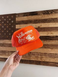 Orange high crown foam snap back trucker hat detailed with beige Yellowstone National Park graphic Vintage Trucker Hats Aesthetic, Trucker Hat Inspiration, Western Trucker Hat, Orange Hat Outfit, Jesus Hats, Cute Trucker Hats, Cricut Hats, Western Trucker Hats, Hat Design Ideas