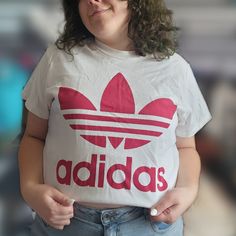 This Adidas Tee Is Perfect For A More Sporty Look, Or Something A Little Streetwear. Worn Maybe Once, It's In Practically Brand New Condition. Would Be Great For Anyone, And Looks Super Cute Styled Multiple Ways. Not Cropped, Just Styled That Way For Photos. Trendy Adidas T-shirt With Letter Print, Adidas Logo Tops, Basic Adidas Logo Crew Neck Tops, Basic Adidas Crew Neck Tops, Spring Cotton Top With Adidas Logo, Basic Adidas Cotton Tops, Adidas Red Crew Neck T-shirt, Red Adidas Crew Neck T-shirt, White Adidas Graphic Tee