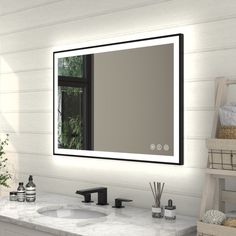 a bathroom vanity with a large mirror above it