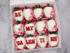 a box filled with chocolate covered strawberries that say be my valentine's day