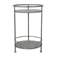 a round metal table with two shelves on each side