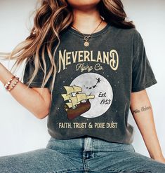 Retro Disney Peter Pan Shirt, Neverland Flying Co Faith Trust & Pixie Dust Est 1953 Shirt Vintage T-shirt With Letter Print For Disney Fans, Vintage T-shirt With Graphic Print For Disney Fan Events, Adult Disney Shirts, Disneyland 2024, Tinkerbell Shirt, Faith Trust Pixie Dust, Peter Pan Shirt, Disney Cricut, Disney Trip Outfits