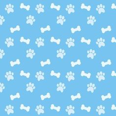 a blue background with white dog paw prints and bones on the bottom half of it