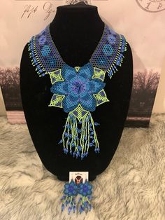 Beautiful set of tribal inspiration, handmade with chaquiras by Mexican artisans. Handmade Turquoise Bohemian Jewelry Sets, Handmade Bohemian Turquoise Jewelry Sets, Handmade Blue Bohemian Bib Necklaces, Blue Beaded Bohemian Jewelry Sets, Bohemian Blue Beaded Jewelry Sets, Blue Bohemian Beaded Jewelry Sets, Inspired Necklace, Necklace And Earrings Set, Beaded Choker Necklace