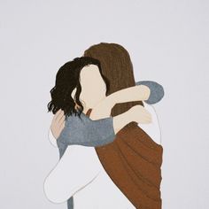 two people hugging each other with one holding the other