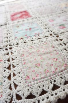 a close up of a doily on a table