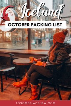 a woman sitting at a table in front of a window with the words iceland october packing list