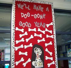 a red banner with white dog bones on it that says, well have a dog - one good year