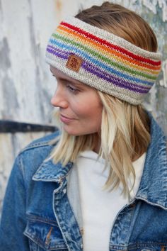 Rainbow stripes with an OOAK twist. This headband will brighten up any winter day!This stunning women's hand knitted wool headband and ear warmer is handmade in Nepal using fair trade practices, and decorated with eye-catching patterns. An accessory that's sure to keep you cozy and in fashion this season!100%WoolFleece linedFair Trade and Handmade in Nepal Machine wool wash max 30 degrees or cool handwash. Short spin. Dry flat. Do not tumble dry. Knitted Rainbow, Hand Knit Headband, Rainbow Headband, Festival Headband, Knitted Headband, Handmade Fair, Knit Headband, Matching Sweaters, Wool Wash