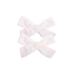 three white bows on a white background