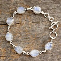 Rainbow Moonstone link bracelet - Mysteries | NOVICA Indowestern Gowns, Multi Gemstone Bracelet, Sterling Silver Name Necklace, Sterling Silver Rings Set, Handcrafted Bracelets, Moonstone Bracelet, Mens Silver Rings, 925 Silver Jewelry, Jewelry Gift Box