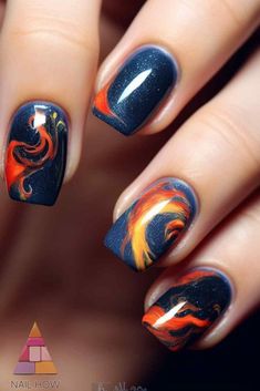 Add a spark to your style with this stunning flame nail design! The navy blue base with orange and yellow flames creates a mesmerizing look on short acrylic nails. Find more inspiration at nailhow.com. Flame Nail Designs, Flame Nails, Silk Wrap Nails, Orange Nail Designs, Nail Prices, Sns Nails, Floral Nail Designs, Blue Nail Polish, Nail Oil