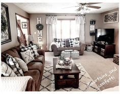 a living room filled with furniture and a flat screen tv