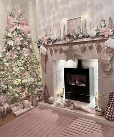 a decorated christmas tree sitting next to a fireplace