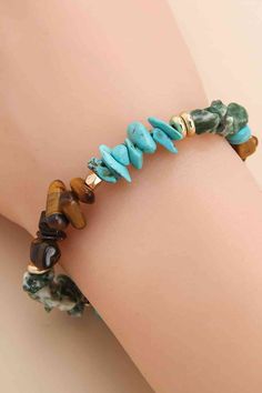 This stunning bracelet features a combination of turquoise and natural stones, creating a unique and elegant piece. With its beautiful colors and natural textures, this bracelet is perfect for adding a touch of sophistication to any outfit. Crafted with precision, this bracelet is sure to make a statement. Tip: The patterns and colors of natural stones will not be exactly the same for each piece. Please refer to the actual product for an accurate representation. Material: Turquoise, Natural ston Brooch Necklace, Natural Stone Bracelets, Girls Jewelry, Stone Bracelet, Natural Texture, Hair Jewelry, Chain Lengths, Chain Length, Beauty Tools