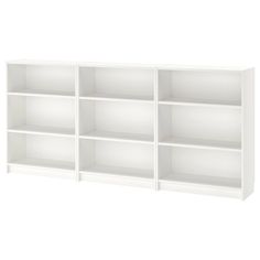 a white bookcase with six shelves on each side