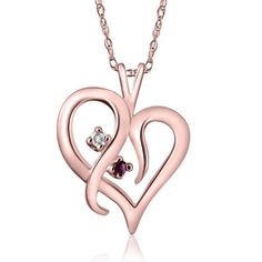 This classic heart pendant features 1 round brilliant cut natural diamond and 1 round brilliant cut ruby gemstones. An 18" 14k white gold clasp lock chain is included. All diamonds are set in solid white gold. Color: 14k rose gold. Gender: female. Age Group: adult. Ruby Diamond Necklace, Lock Chain, Gold G, Heart Necklace Diamond, Rose Gold Pink, Necklace Heart, Heart Pendant Diamond, Heart Shape Pendant, Ruby Diamond