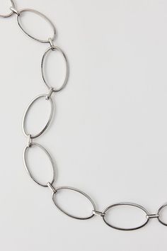 Minimal metal boho belt in delicate chain with an adjustable closure. Features Oval ring chain belt Delicate chain belt Oval ring links Adjustable fit Content + Care Mixed metal Wipe clean Imported Size + Fit S/M=37" L/XL=41" | Oval Ring Chain Belt in Silver, Women's at Urban Outfitters Modern Adjustable Jewelry With Chain Strap, Minimalist Everyday Jewelry With Chain Strap, Adjustable Silver Metal Chain Belt, Modern Jewelry With Oval Link Chain Strap, Adjustable Minimalist Jewelry With Chain Strap, Minimalist Jewelry With Adjustable Chain Strap, Oval Metal Jewelry With Adjustable Chain, Adjustable Silver Bracelets With Chain Strap, Adjustable Link Chain Necklace In Metal