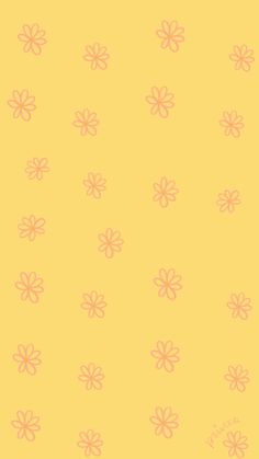 a yellow background with pink flowers on it