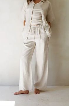 Woven 100% Linen Elastic Waist Band Tie Strap Wide Leg Pants With Side Pockets (No Lining) Optional Set Style# AR1060-1 AR1062-1 Material: 100% LinenColor: Linen White Plain Bottoms For Summer, Plain White Summer Bottoms, Plain Beige Summer Bottoms, Spring Wide-leg Plain Pants, Relaxed Wide Leg Pants With Pockets In Solid Color, Plain Summer Trousers, Relaxed Solid Color Pants With Loosely Fitted Hips, Relaxed Solid Pants With Loosely Fitted Hips, Casual White Plain Pants