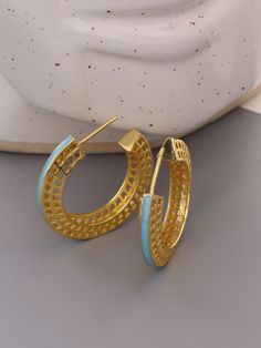 Beautiful Designer and light weight hoops. Very trendy and light weight, easy to put on. Sleek enamel line adds color and style to the whole design. Made with High quality Italian Brass, Non-allergic and anti tarnish. Gold Enamel Hoop Jewelry, Yellow Gold Enamel Hoop Earrings For Pierced Ears, Yellow Gold Enamel Hoop Earrings, Gold Enamel Hoop Earring (sold Individually), Gold Enamel Hoop Earrings, Gold Enamel Hoop Earrings Gift, Trendy Gold Enamel Hoop Earrings, Trendy Gold Enamel Earrings, Blue Gold-plated Hoop Earrings