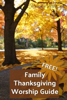 the words free family thanksgiving worship guide are in front of trees with leaves on them