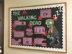 a bulletin board with the walking dead written on it