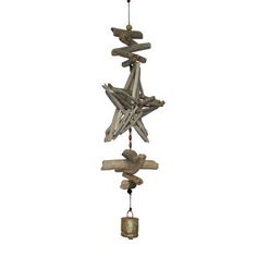 a wind chime made out of driftwood with bells hanging from it's sides