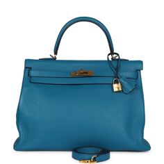 This Kelly, in the Retourne style, is in the Cobalt clemence leather with gold hardware, has tonal stitching, two straps with front toggle closure, clochette with lock and two keys, single rolled handle and removable shoulder strap.The interior is lined with Cobalt chevre leather and features one zip pocket with an Hermes engraved pull and two open pockets on the opposite side.Collection: Q SquareOrigin: FranceCondition: Pre-owned; Excellent to Mint -  This bag is slightly relaxed in shape structure around the bottom. There is no plastic on the hardware. There are a few small hairline scratches to the hardware feet. The exterior leather has minor scuffing around the bottom corners but no other signs of wear. The interior leather is clean with no signs of wear.Accompanied by: Hermes dustbag Hermes Kelly 35, Cobalt, Mint Condition, Zip Pockets, Clutch Bag